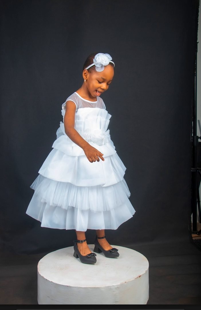 Before: a portrait on a plain studio backdrop